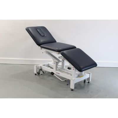 Metron T6700 3 Section Twin Lift Hydraulic Couch mid height with its head section lifted