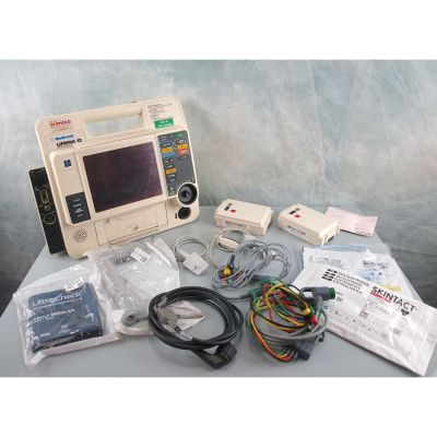 Physio Control Medtronic LifePak 12 with 2 Batteries , ECG & Therapy leads, SPO2, NIBP