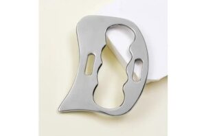 A stainless steel Gua Sha massage tool with ergonomic cut‑outs and a polished finish, designed for muscle scraping, myofascial release and soft‑tissue therapy.